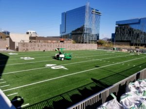 Putting the finishing touches on the new ASU Sundevils Football artificial grass agility field